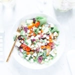 Chopped Greek salad in a bowl from above.