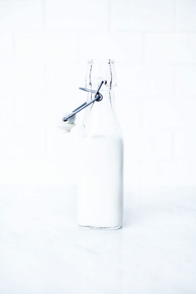 Coconut milk in a glass bottle.
