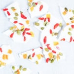 Coconut butter bark with goji berries, pumpkin seeds, and dried mango.