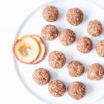 Apple pie energy bites on a white plate.
